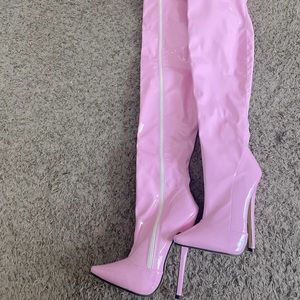Over the thigh pink shiny boots